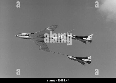 Aircraft Handley Page Valliant Tanker Thirsty English Electric F2 Lightning s XN782 K XN787 M of 19 Sqd plug into a Victor K2 XH667 refueling tanker in 1965 over RAF Marham during a flying demonstration August 1965 Stock Photo