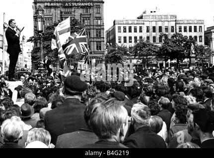 Ulster Vanguard leader William Craig addressing workers from James Mackie and Sons who marched from their Springfield Road factory to the City Hall in protest against the lack of security that allowed IRA gunmen to shoot at and injure their fellow workers leaving the factory in Belfast Northern Ireland May 1972 Stock Photo
