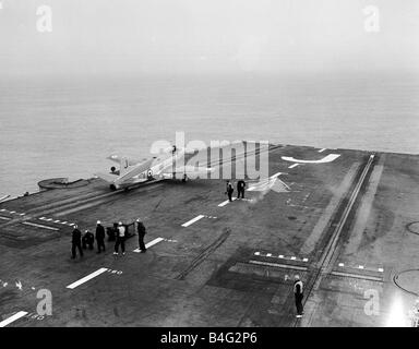 Ships Royal Navy Aircraft Carrier HMS Eagle March 1952 Fleet Air Arm Supermarine Attacker F1 aircraft launches with the assistance of the steam catapult from the flight deck of the Aircraft Carrier Stock Photo