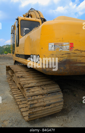 A John Deere construction excavator on a construction site Stock Photo
