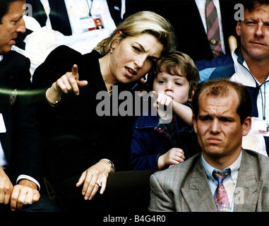 Tatum O Neal Actress wife of Tennis star John McEnroe with her son Kevin watching him playing at Centre Court Stock Photo