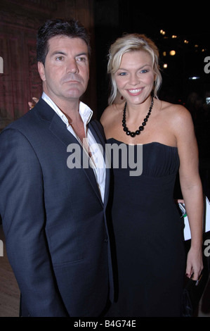 Simon Cowell and Kate of X Factor arriving at the Royal Albert Hall for The National TV Awards October 2005 Stock Photo