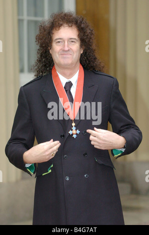 Brian May seen here in the courtyard of Buckingham Palace following the presentation of a CBE awarded for services to music by Stock Photo
