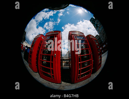 Four British phone boxes Stock Photo