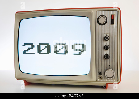 A television with a black and white image of '2009' Stock Photo