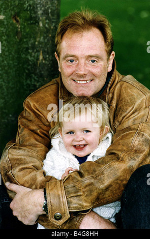 Bruce Jones milkman actor star of RAINING STONES with his grandaughter Sophie Stock Photo