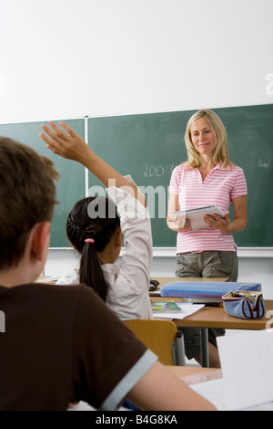 A teacher teaching a class, over the shoulder view Stock Photo