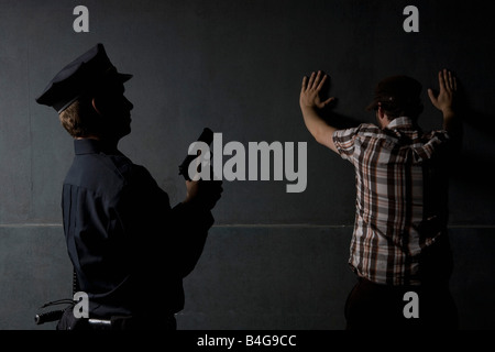 A Police Officer Arresting A Criminal Stock Photo - Alamy