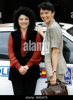 Kerry Peers with Fuzzy Hair and Mary Jo randle on the set of the Television series The Bill Stock Photo