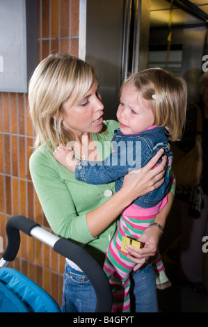 little girl having a tantrum in a shopping centre Stock Photo