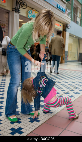 little girl having a tantrum in a shopping centre Stock Photo