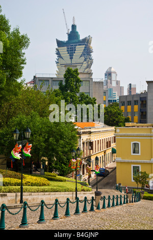 The 258 metres 846 feet 58 floors Grand Lisboa casino and hotel under construction rises above the skyline Macau China JMH3333 Stock Photo