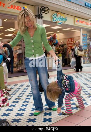 little girl having a tantrum in a shopping centre Stock Photo