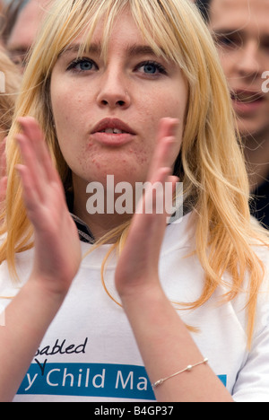 Young woman supporting the End Child Poverty campaign, Trafalgar Square, London UK. Sat 4th October 2008 Stock Photo