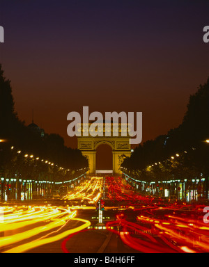 Triumphal arch lit up at night, Arc De Triomphe, Paris, Ile-de-France, France Stock Photo