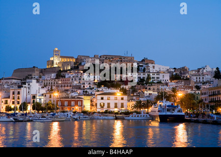 Buildings in town lit up at night, Dalt Vila, Ibiza, Balearic Islands, Spain Stock Photo