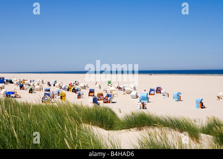 Hooded beach chairs on beach Juist East Frisian Islands Lower Saxony Germany Stock Photo