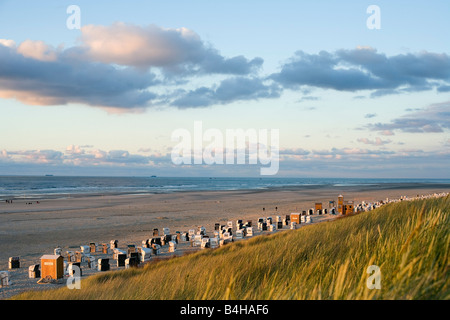 Hooded beach chairs on beach Spiekeroog East Frisian Islands Lower Saxony Germany Stock Photo