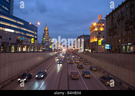 Traffic on road at dusk, Arbatskaya Station, Moscow, Russia Stock Photo