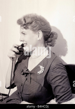 Actress Ethel Barrymore talking on the phone June 1955 Stock Photo