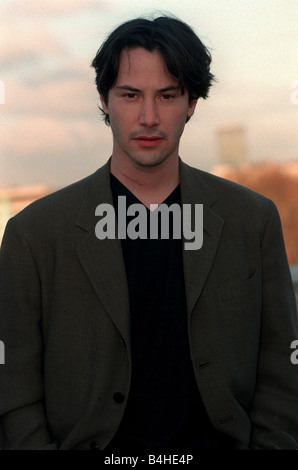 Keanu Reeves Actor December 97 Who is staring in the film Devil s Advocate with co star Charlize Theron Stock Photo