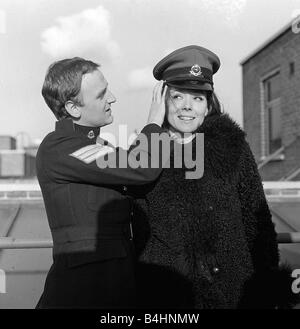 John Thaw March 1966 Actor aged 24 years old starring as Sgt John Mann in ABC Production Redcap for BBC Television Pictured with Diana Rigg Actress during Photocall on the roof of ABC TV in Hanover Square London Diana Rigg Emma Peel star of The Avengers TV Programme current series just ended wishes luck to John Thaw whose new Redcap series is about to begin Stock Photo
