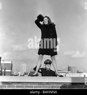 John Thaw March 1966 Actor aged 24 years old starring as Sgt John Mann in ABC Production Redcap for BBC Television Pictured with Diana Rigg Actress during Photocall on the roof of ABC TV in Hanover Square London Diana Rigg Emma Peel star of The Avengers TV Programme current series just ended wishes luck to John Thaw whose new Redcap series is about to begin Mirrorpix Stock Photo