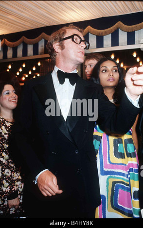 Michael Caine and his wife at the film Premiere Live and Let Die July 1979 DBASE MSI Stock Photo