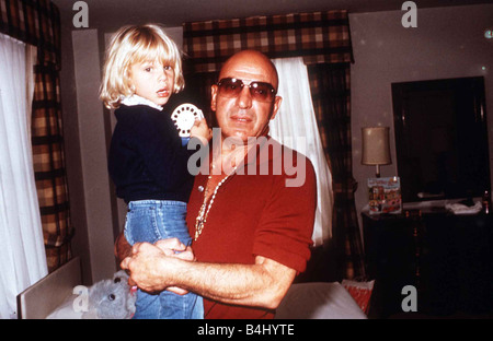 Telly Savalas the actor from Kojak with his son Nicholas February 1977 Dbase msi Stock Photo
