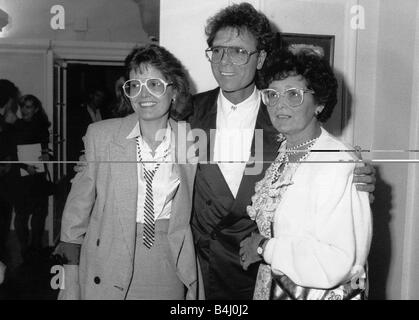 Cliff Richard singer actor with his mother and sister at a party celebrating 30 years in showbiz October 1988 Stock Photo