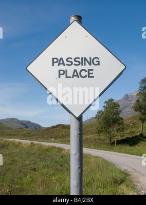 Passing place sign on narrow road, Scotland Stock Photo