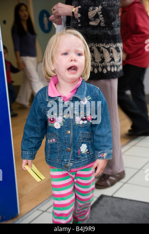 little girl having a tantrum in a shopping centre Stock Photo