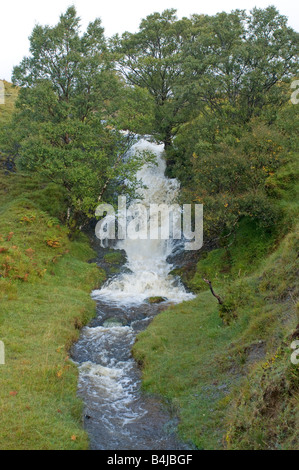 Turbulent water following heavy rains rush down a Sutherland Hillside in North West Scotland Stock Photo