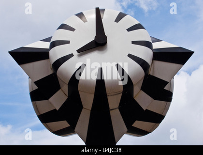 Unusually designed white and black striped station clock outside The Hague central railway station, Netherlands Stock Photo