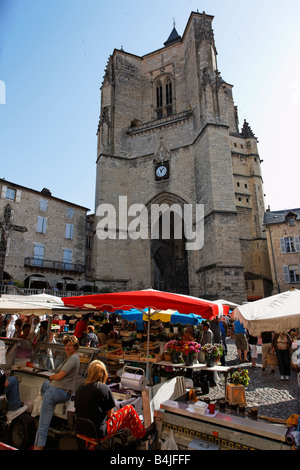 A market day in front of the Church Notre-Dame, at Ville-Franche de Rouerge, France Stock Photo