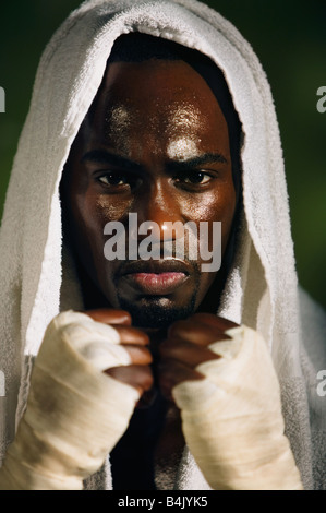 African male boxer with towel on head Stock Photo