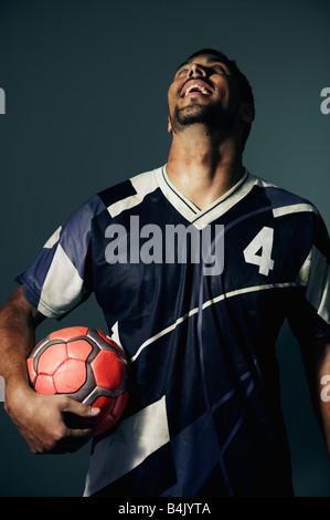 Smiling Hispanic Male Soccer Player Stock Photo - Alamy