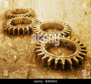 Interlocking gears on grunge style background Stock Photo