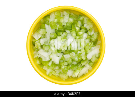 A bowl of chopped onions and bell pepper isolated on white Stock Photo