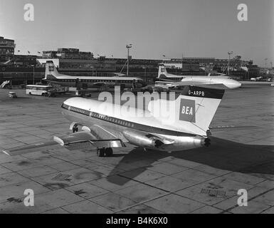 Aircraft DeHavilland DH 121 Trident 1C Sep 1962 DeHavilland Trident 1C at Heathrow Airport in the colour scheme of BEA British European Airways in the background are 2 Vickers Vanguards LFEY003 Flight100 Stock Photo