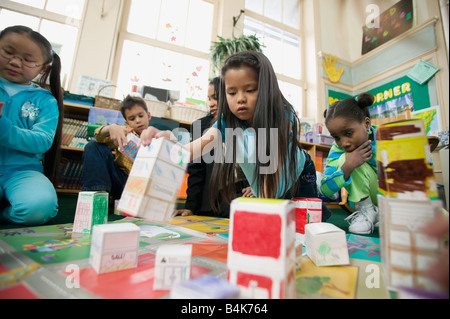Multi-ethnic students in classroom Stock Photo