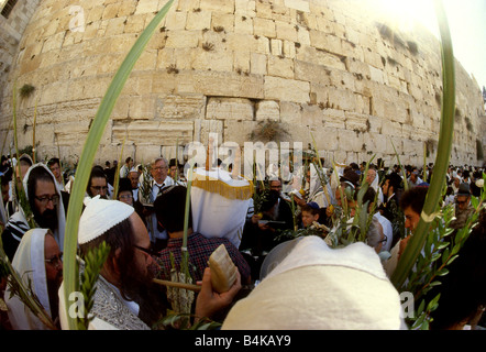 Blowing the Shofar at the Wailing Wall during Succot celebrations Stock Photo