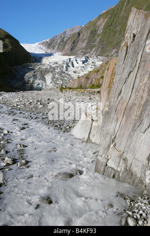 River and rock formation in front of the Franz Josef Glacier West Coast South Island New Zealand Stock Photo