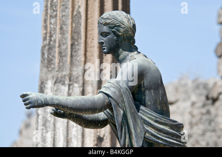 Bronze statue in the Temple of Apollo in the ruins of Pompeii Stock Photo