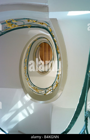 Germany, Berlin, historic spiral staircase with golden ornaments at the Rosenhoefe Stock Photo