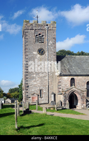 West tower and South porch. Church of Saint Oswald, Ravenstonedale, Cumbria, England, United Kingdom, Europe. Stock Photo