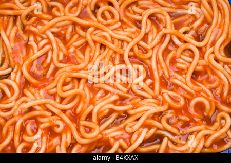 a background of tinned spaghetti Stock Photo