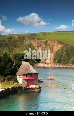 pretty pink boathouse in devon Stock Photo