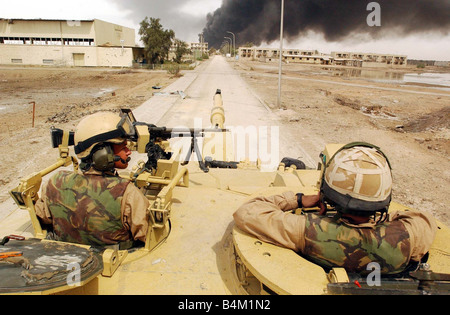 Iraq War 2003 Elements of the Royal Scots Dragoon Guards reach the out skirts of the Southern Iraqi city of Basra Our Picture Shows Alex Matheson with his Challenger 11 tank Stock Photo