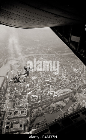 Aerial view of London July 1979 The 11 man team of RAF Falcon parachute dispaly team jumped into the London s Horse Guard this morning to publicise this months royal Tournament at Earls Court They jumped out of the rear of RAF Hercules Sky divers 1970s Mirrorpix 1st March 1912 1912 US Army captain Albert Berry becomes the first man to parachute from an aeroplane lafmar05 Stock Photo